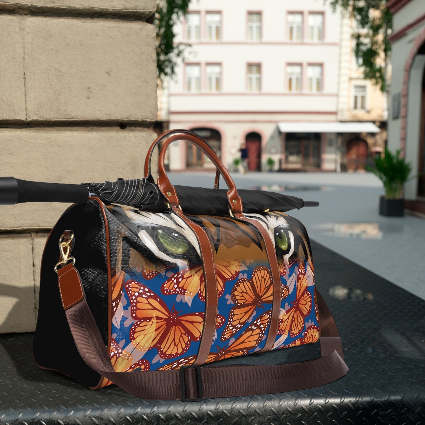 Jungle Tiger eyes, Waterproof Travel Bag, multiple compartments, a resilient carrying handle, and an adjustable shoulder strap